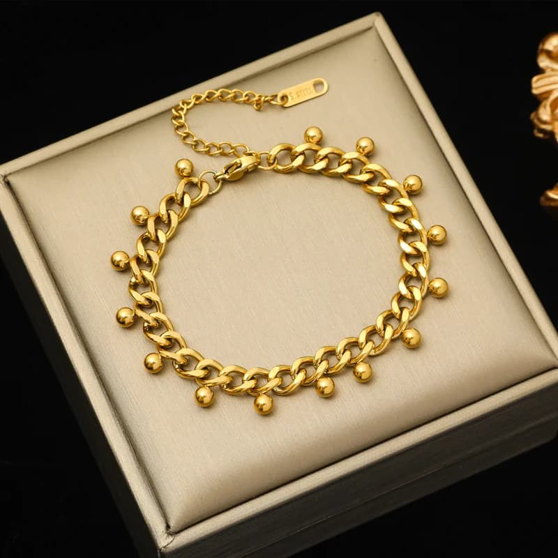 Dikke geometrische schakelarmband, goud verguld