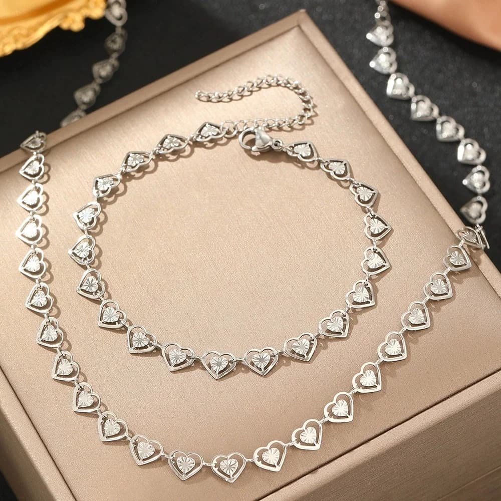 Zilveren hart halsketting, armband en oorbellen set