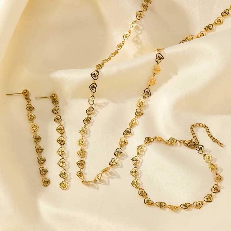 Zilveren hart halsketting, armband en oorbellen set