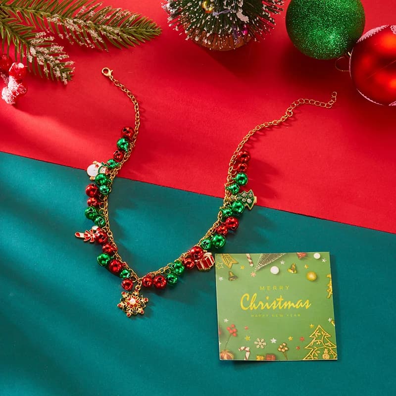 Kerst sneeuwvlok en bel hanger ketting
