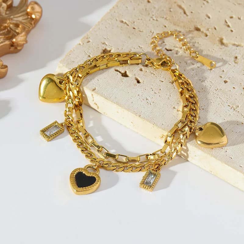 Omkeerbare hart bedelarmband, verguld