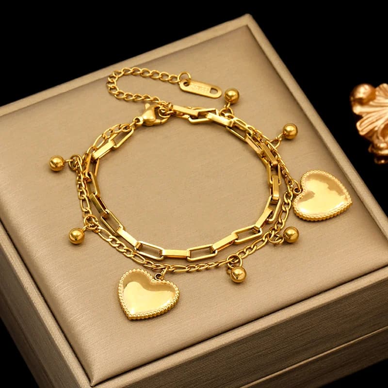 Omkeerbare hart bedelarmband, verguld