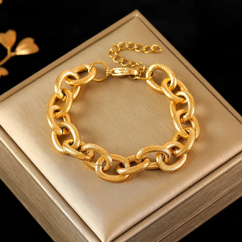Dikke geometrische schakelarmband, goud verguld