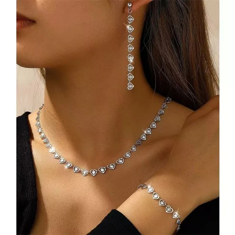 Zilveren hart halsketting, armband en oorbellen set