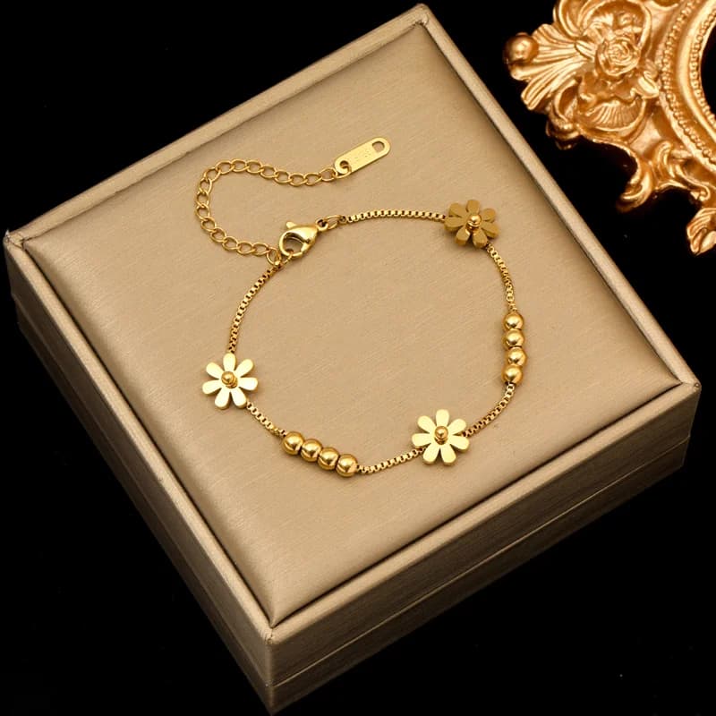 Gouden bloem halsketting en armband set
